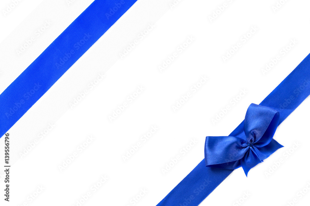 Blue shiny ribbon bow isolated on white background Blue shiny ribbon bow isolated on white background