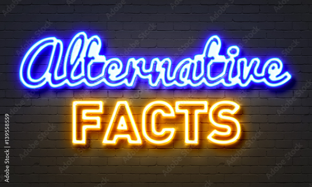 Alternative facts neon sign on brick wall background.