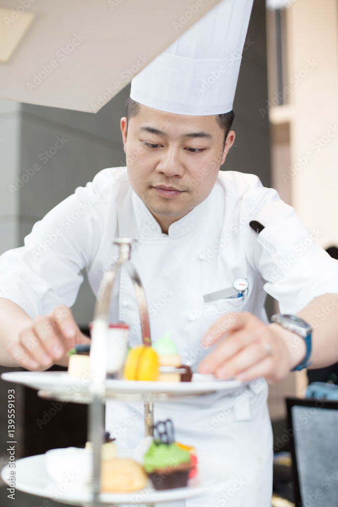 young man chelf makes food