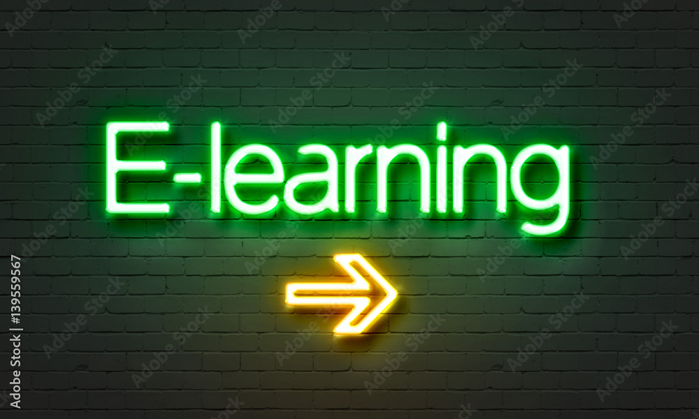 E-learning neon sign on brick wall background.