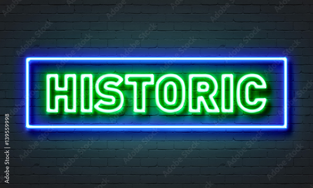 Historic neon sign on brick wall background. Historic neon sign on brick wall background.
