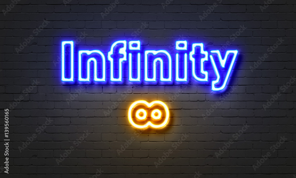 Fototapeta premium Infinity neon sign on brick wall background.