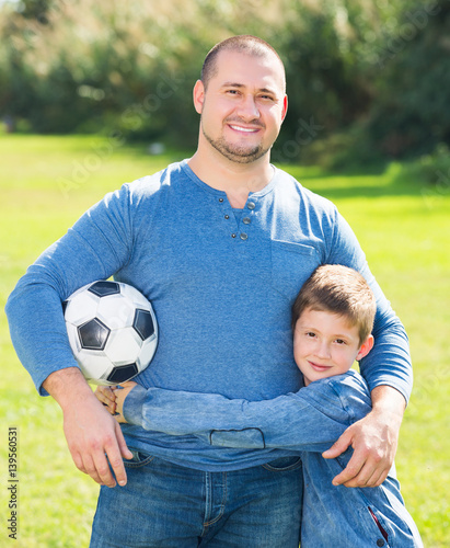 Father and son with ball