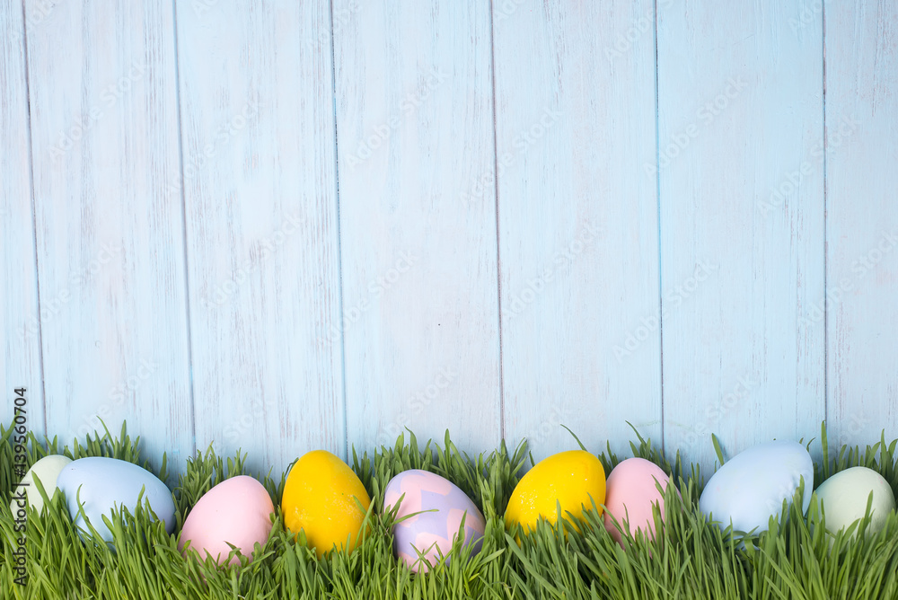 Fototapeta premium decorated easter eggs in the grass