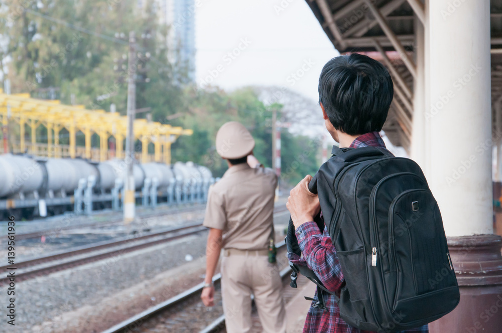 Man in train station waiting to travel,selective focus. Man in train station waiting to travel,selective focus.