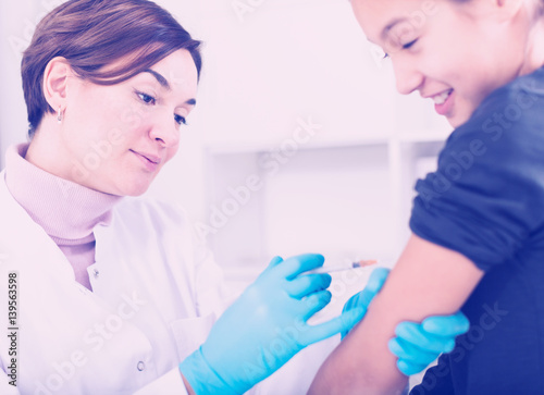Doctor makes injection girl