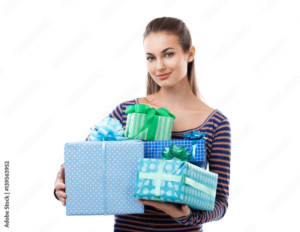 Young beautiful woman holding gift boxes isolated on white background Young beautiful woman holding gift boxes isolated on white background