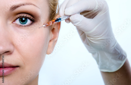 Injection for the rejuvenation of the skin around the eyes.