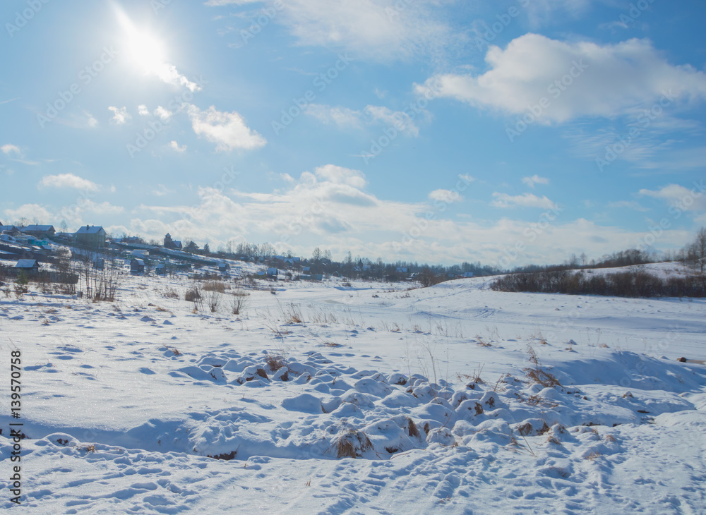 frozen river in winter on a Sunny day.