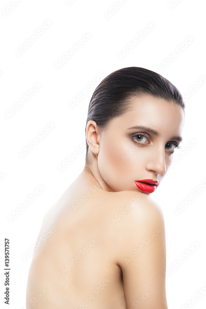 Young topless lady looking at camera over shoulder isolated on white. Young topless lady looking at camera over shoulder isolated on white.