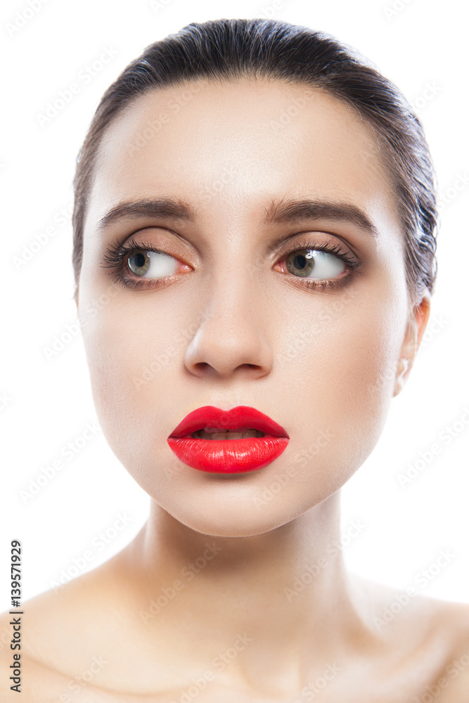 Young woman looking away with red lipstick isolated on white. Young woman looking away with red lipstick isolated on white.