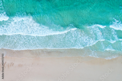 Aerial view. Top view.amazing nature background.The color of the water and beautifully bright.Azure beach with rocky mountains and clear water of Thailand ocean at sunny day.