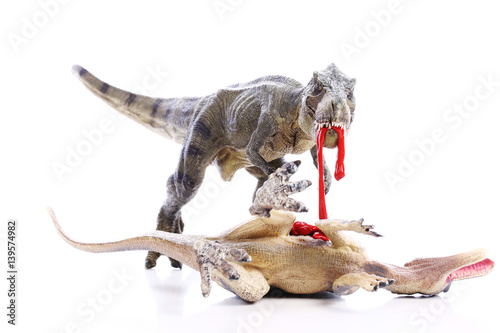 Combattimento tra Spinosauro e Tirannosauro rex photo