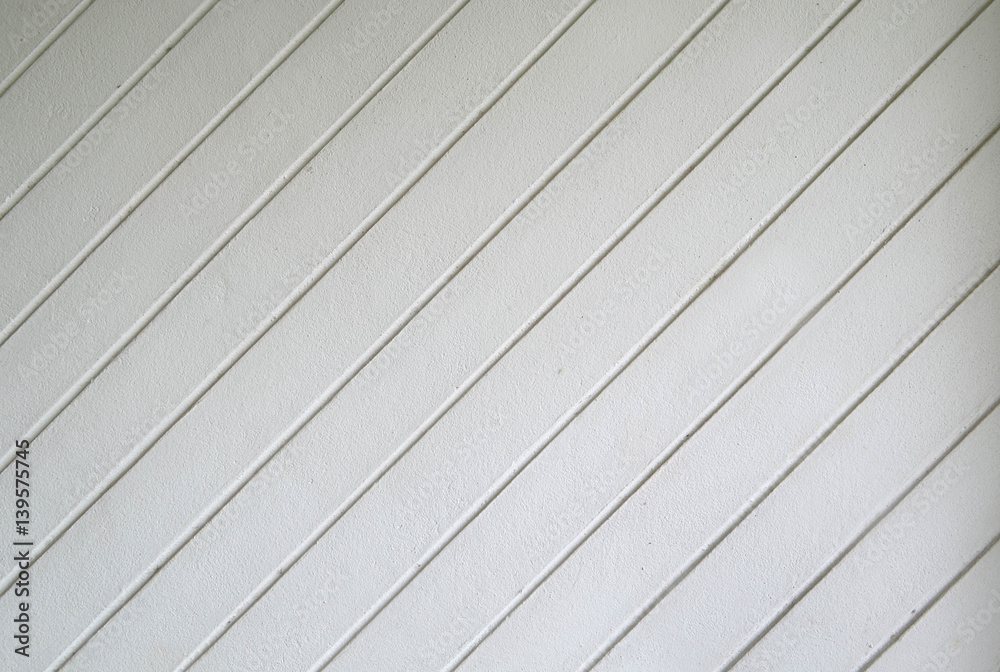 White cement wall with diagonal line White cement wall with diagonal line