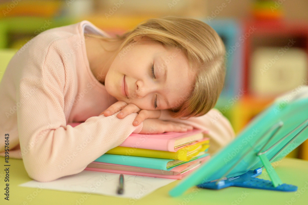 Girl sleeping on books Girl sleeping on books