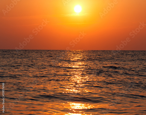 Warm summer sunset over sea