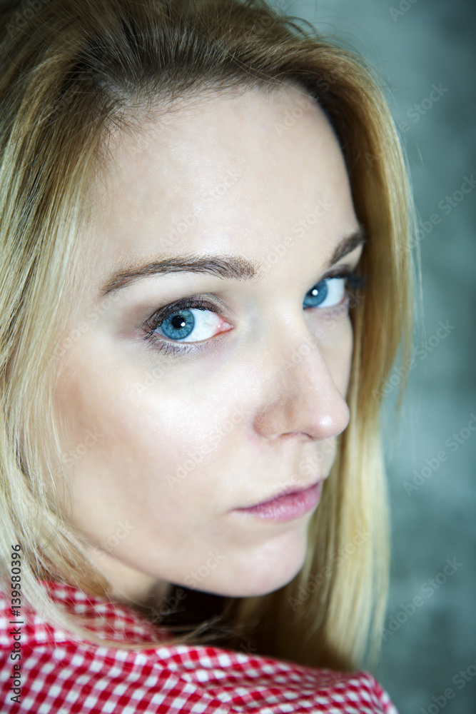 Cheerful portrait of a young woman with long blond hair Cheerful portrait of a young woman with long blond hair