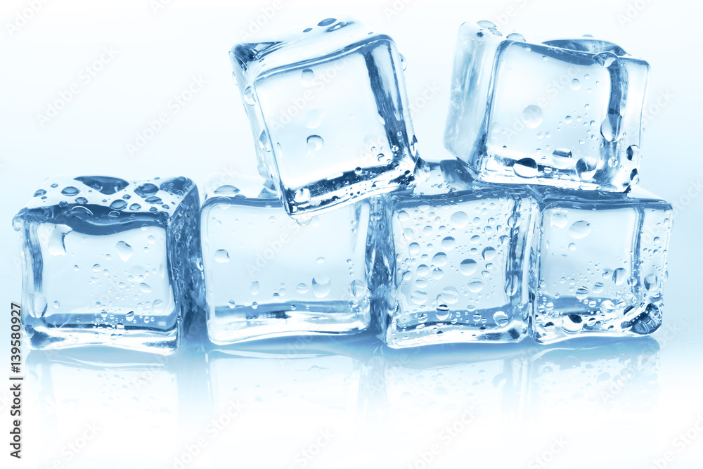Transparent ice cubes group on white background with water drops Transparent ice cubes group on white background with water drops