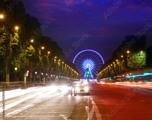 Champs Elysees in Paris and Concorde sunset