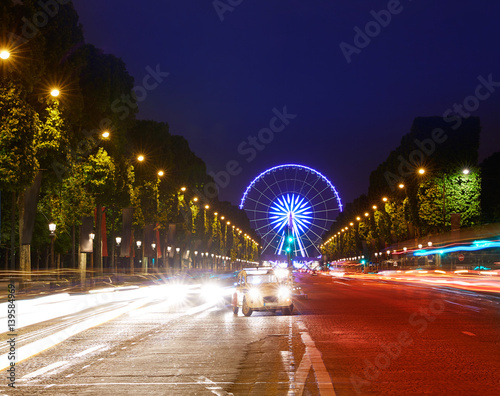Champs Elysees in Paris and Concorde sunset