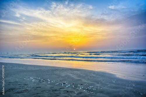  Sunrise  Written on the Beach at Sunrise. HDR