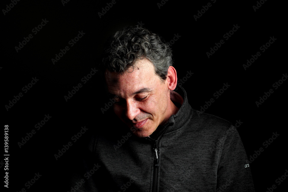 Fototapeta premium Portrait of stylish handsome midlle aged man smile on black background.Dressed well