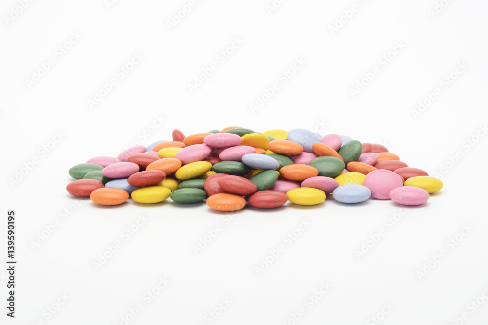 Caramelos de chocolate y colores diversos Caramelos de chocolate y colores diversos