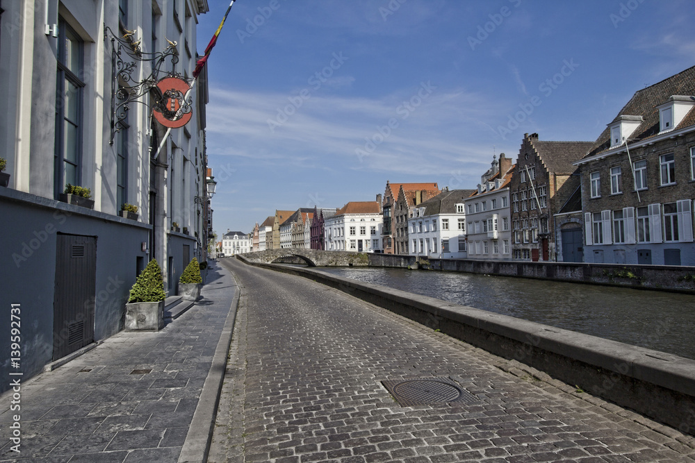 Historical buildings on a canal in Bruges, Belgium