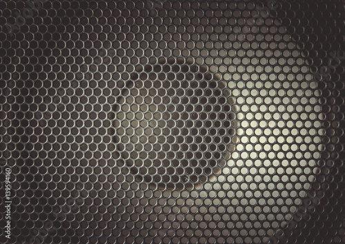 Detail shot of some round speakers. Speaker grill texture. Audio equipment.