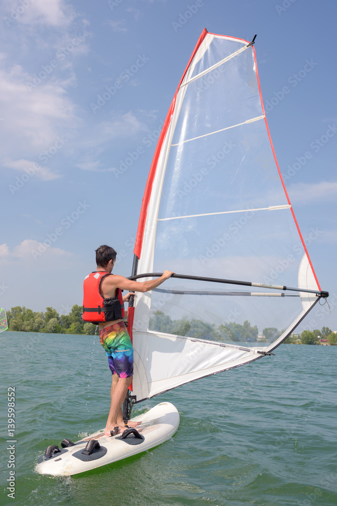 Fototapeta premium Man on windsurfer