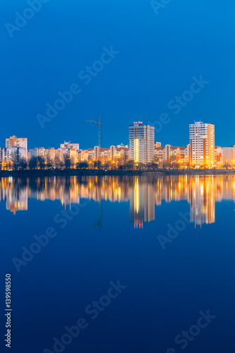 Night View Of Urban Residential Area Overlooks To City Lake Or River © Grigory Bruev