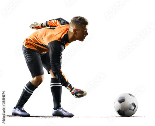Professional soccer goalkeeper in action on white background