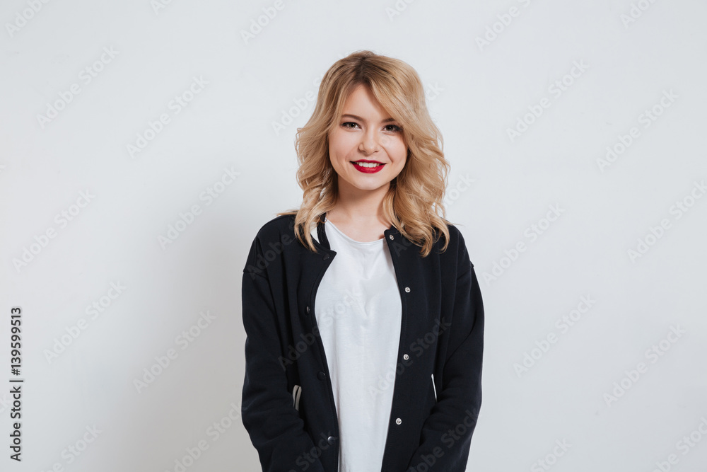 Portrait of a smiling attractive woman wearing casual clothes Portrait of a smiling attractive woman wearing casual clothes