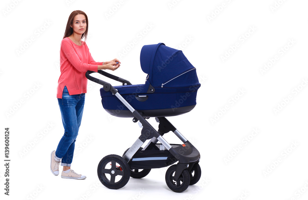 Full length portrait of a mother with a stroller, isolated on white background Full length portrait of a mother with a stroller, isolated on white background