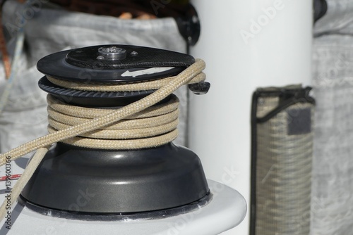 Details of winches and ropes on sailing boat racer, boating concept.