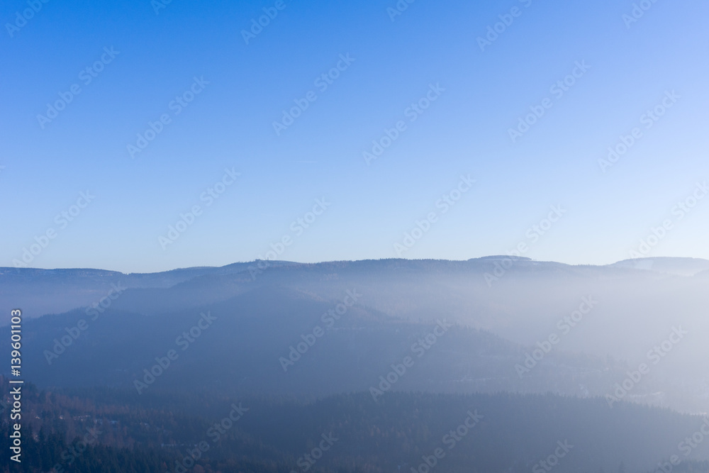 View from Yburg castle with fog in the valley and Mehliskopf on right side