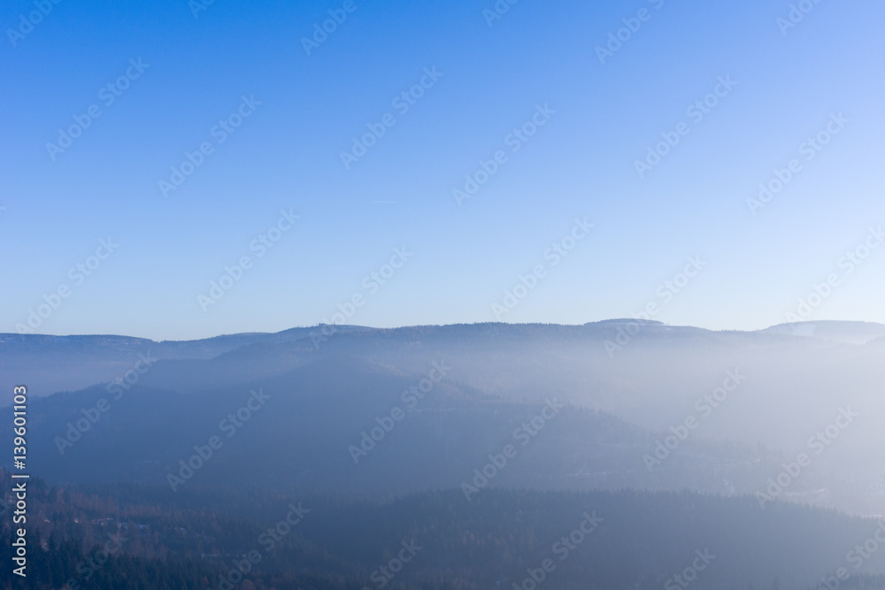 View from Yburg castle with fog in the valley and Mehliskopf on right side View from Yburg castle with fog in the valley and Mehliskopf on right side