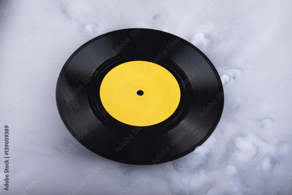 Obraz premium Vinyl record in clouds. Conceptual image. Retro sound