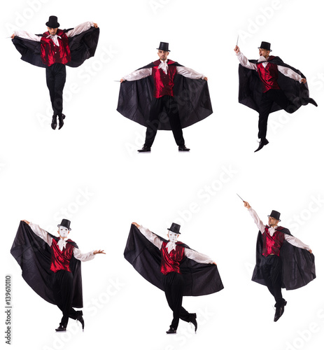 Man magician isolated on white