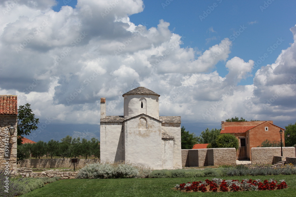 Fototapeta premium an old church in croatia pag nin on a summer day 