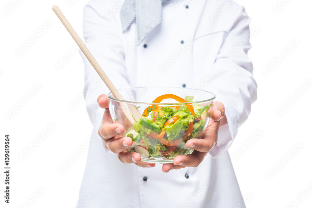 fresh tasty salad in the bowl holding a professional chef, salad closeup fresh tasty salad in the bowl holding a professional chef, salad closeup