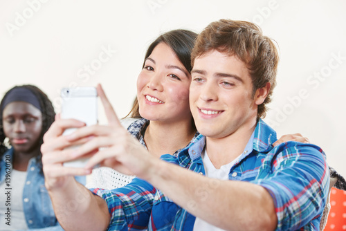 Boy and girl take a selfie