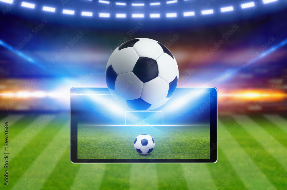 Naklejka premium Soccer game online concept, green soccer field, bright spotlight