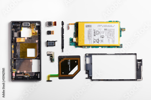 Obraz na plátně Disassembled mobile phone