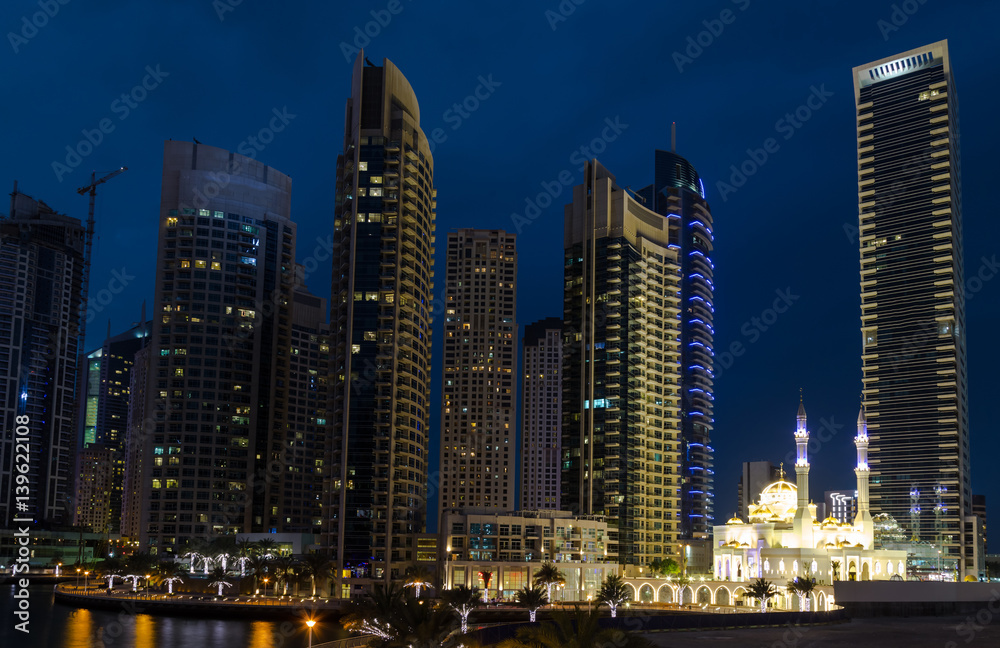 Skyscrapers in Dubai Marina at night . United Arab Emirates