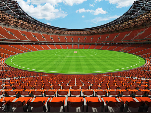 3D render of a round cricket stadium with orange seats and VIP boxes