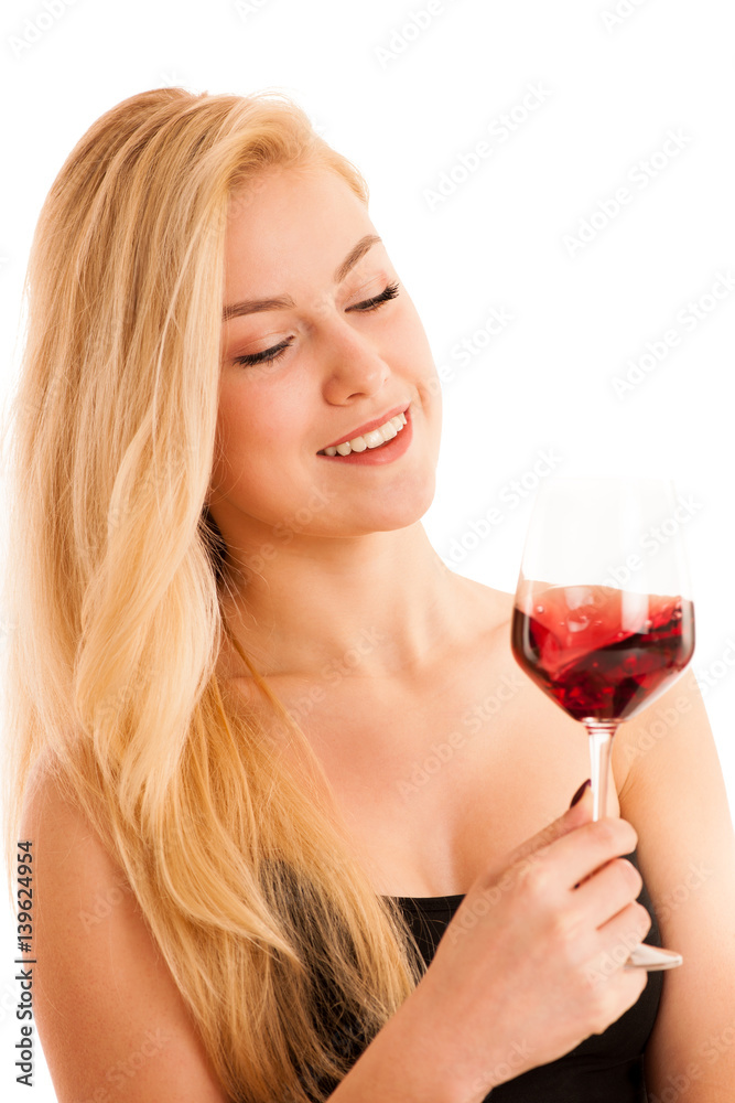 Cute blonde woman drinks a glass of red wine isolated over white background Cute blonde woman drinks a glass of red wine isolated over white background