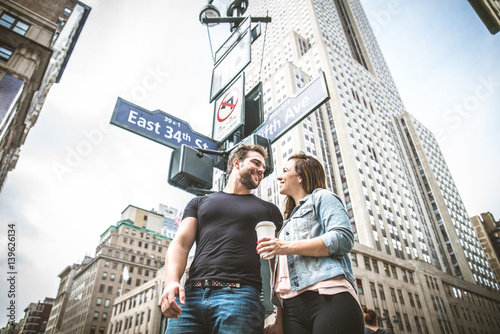 Couple walking in New York © oneinchpunch