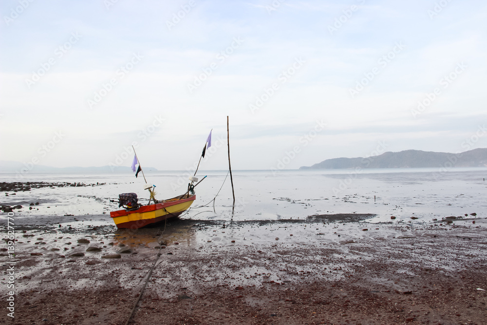 Fototapeta premium Minimalist of lonely boat at sea