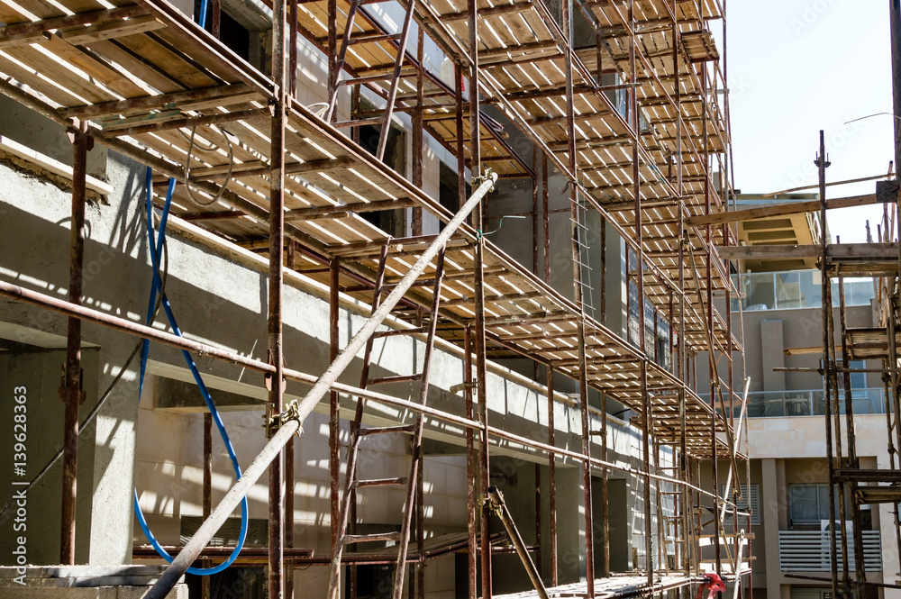 Metal scaffolding with wooden beams